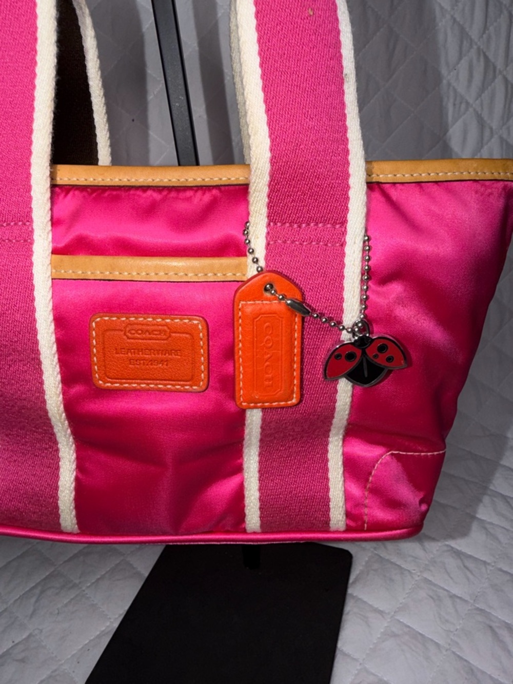 Coach Pink Hampton mini tote with ladybug charm